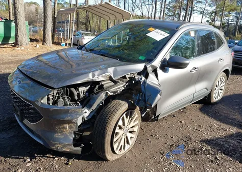 2021 Ford Escape Titanium z USA, uszkodzony, nr VIN 1FMCU9J90MUA58624